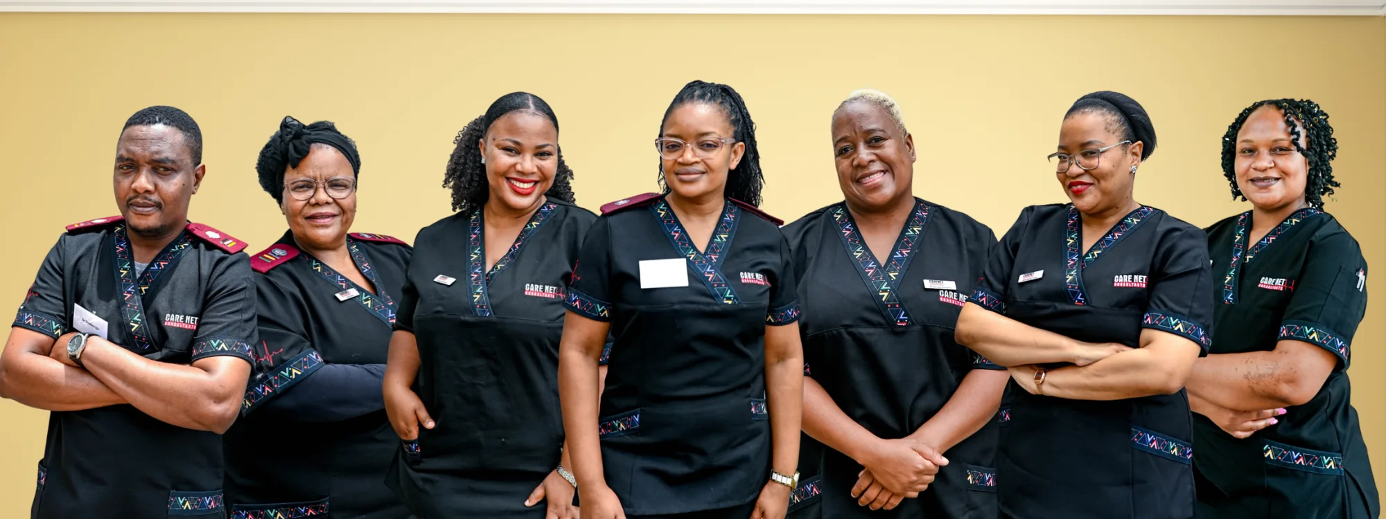 The Care Net team in branded scrubs.